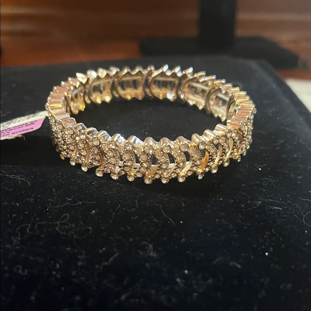 Macys Stretch Bracelet with return tag marked RG Crystal